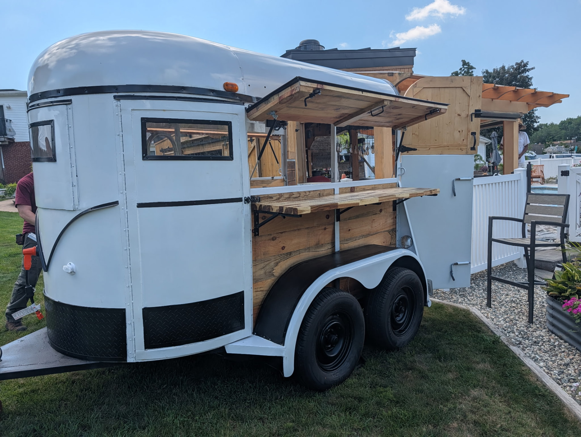 Side view of the trailer bar with the serving hatch open